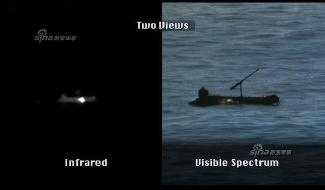 目标艇被激光束照射发出阵阵烟雾