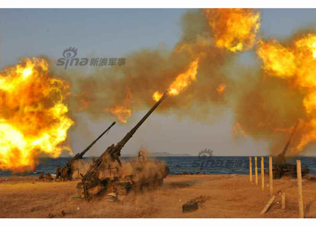 万炮齐发火力足 金正恩视察朝远程炮兵火力演习