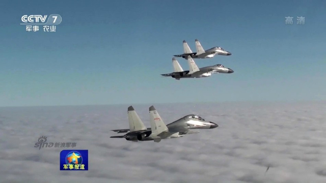 一眼望不到边!我歼11战机出动演习机库数不清
