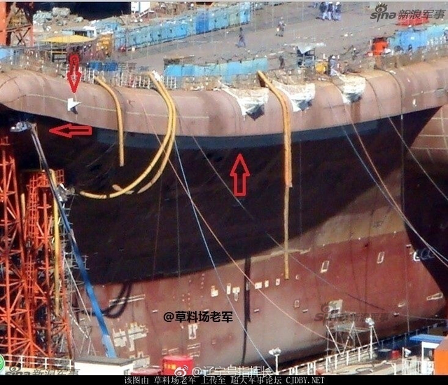 中国国产航母下水指日可待 现疑似正在安装舷窗