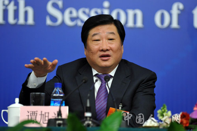 人大代表谭旭光回答记者提问