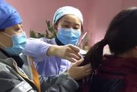 致敬!女护士为援助武汉剪去长发